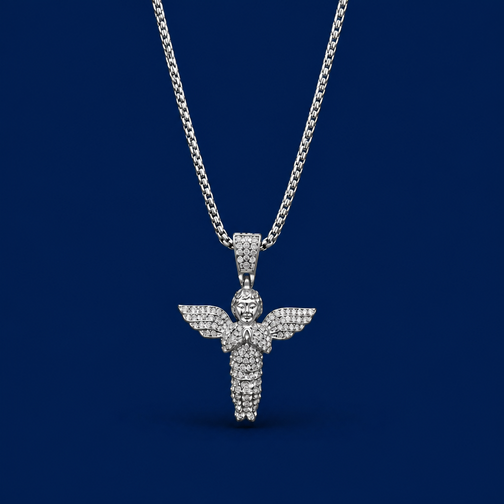 Silver angel pendant necklace on a dark blue background