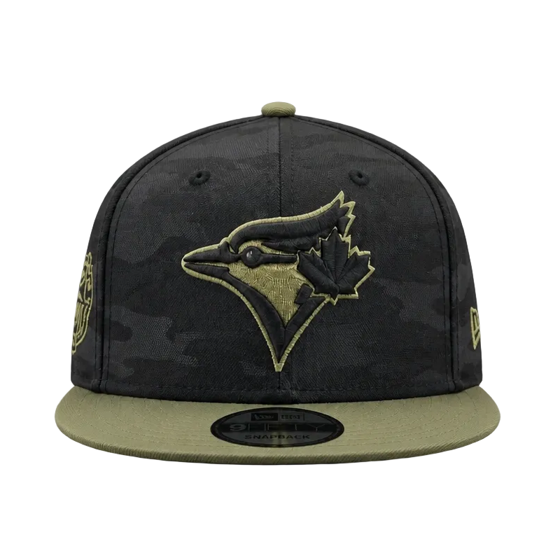 Black and green baseball cap with logo on a gray background