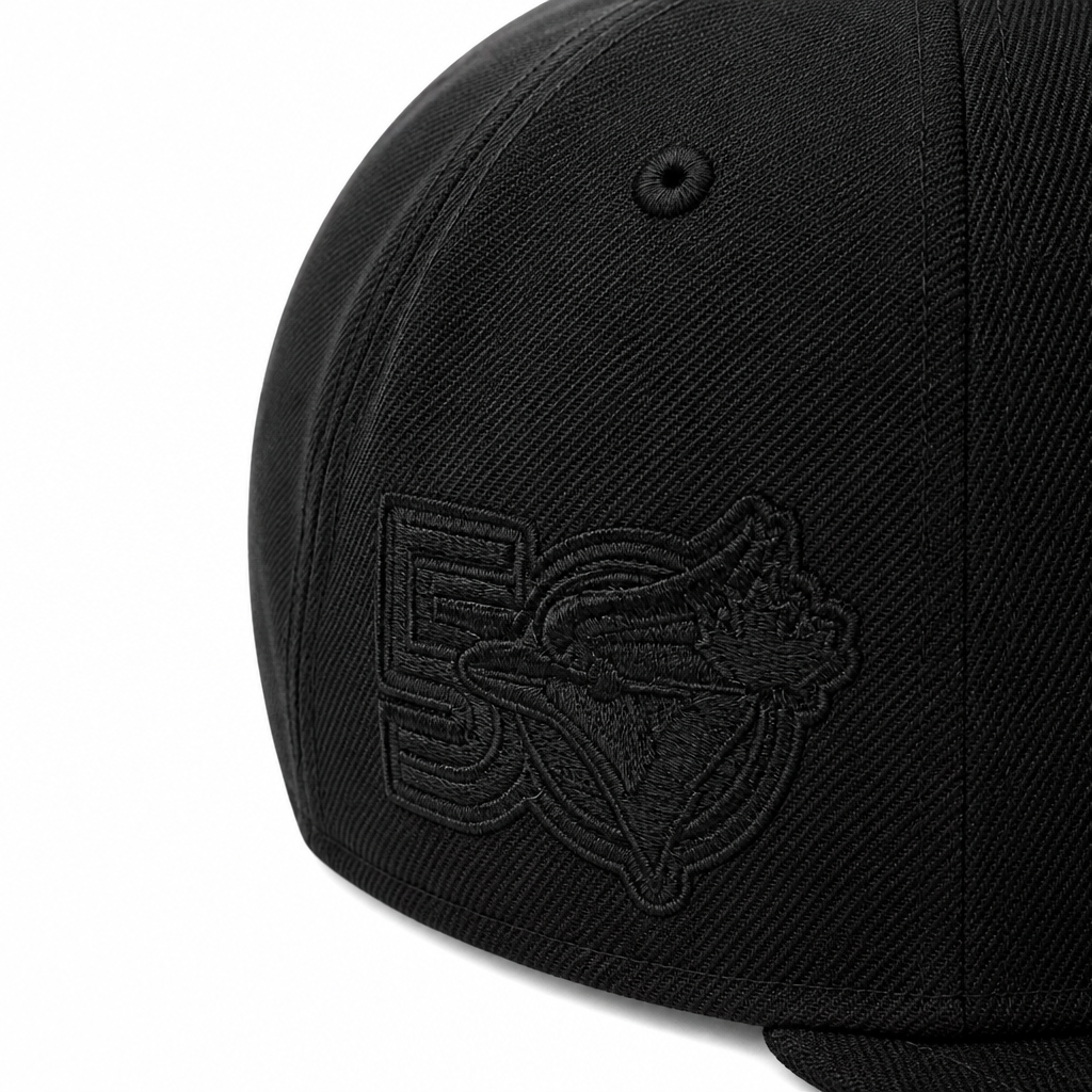 Black cap with a logo on the side against a white background