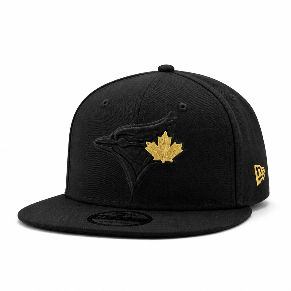 Black cap with a gold maple leaf logo on a white background