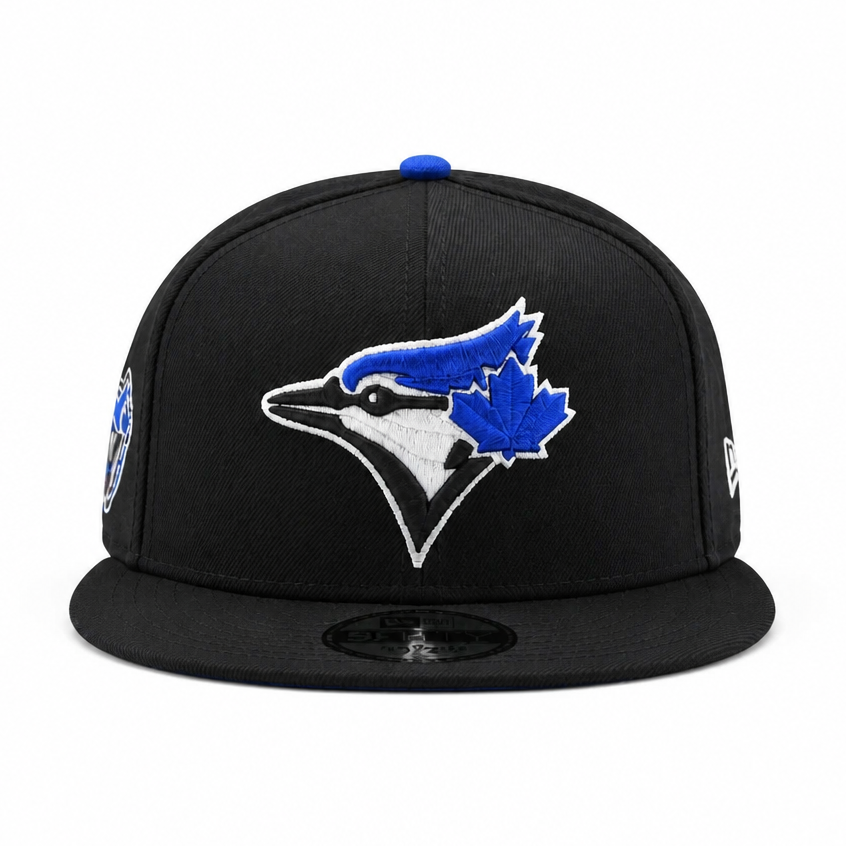 Black baseball cap with a blue and white logo on a white background