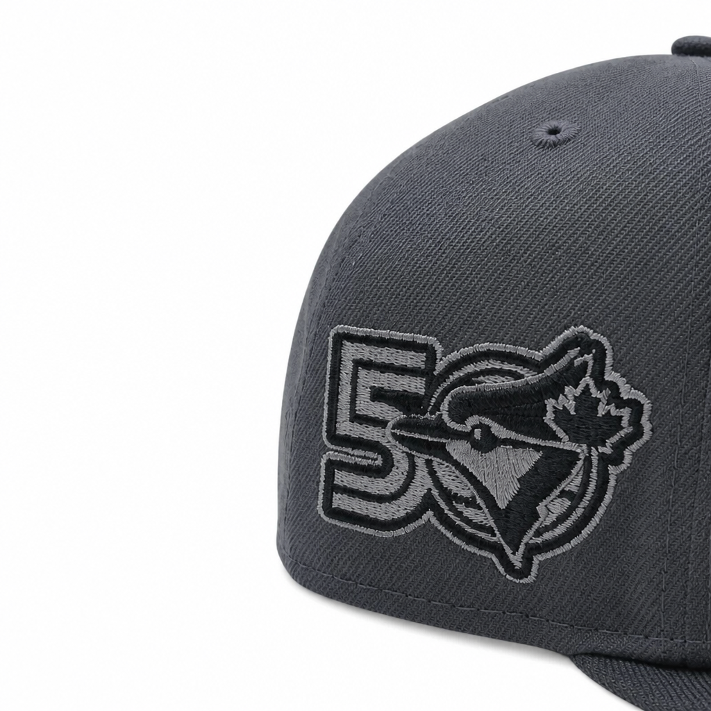 MEN'S NEW ERA MLB GRAPHITE & BLACK TORONTO BLUE JAYS 50TH SEASON PATCH 9FIFTY SNAPBACK HAT