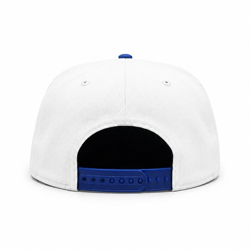 White snapback cap shown from the back, featuring a blue button on top and a blue adjustable strap with metal eyelets.