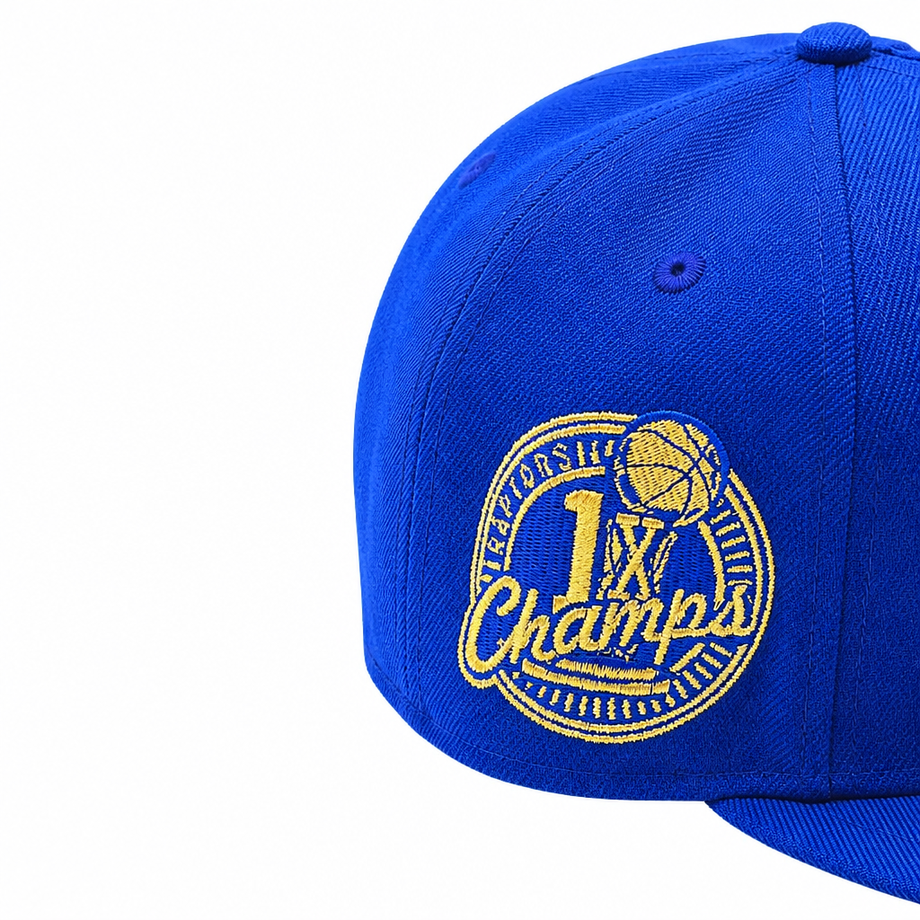 NEW ERA 9FIFTY NBA TORONTO RAPTORS 1X CHAMPS BLACK ROYAL BLUE/GOLD SNAPBACK HAT