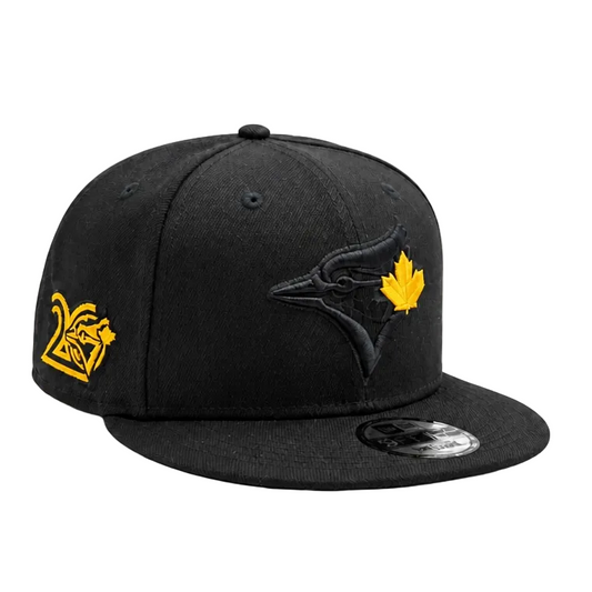 NEW ERA 9FIFTY MLB TORONTO BLUE JAYS 20TH ANNIVERSARY ALL BLACK & GOLD LEAF SNAPBACK HAT