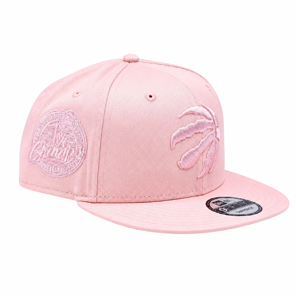 NEW ERA 9FIFTY NBA TORONTO RAPTORS 1X CHAMPS BLUSH PINK SNAPBACK HAT