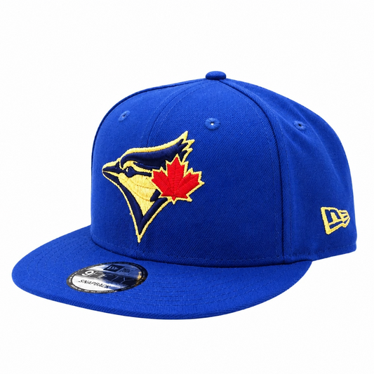 NEW ERA 9FIFTY TORONTO BLUE JAYS ROYAL BLUE/GOLD SNAPBACK HAT