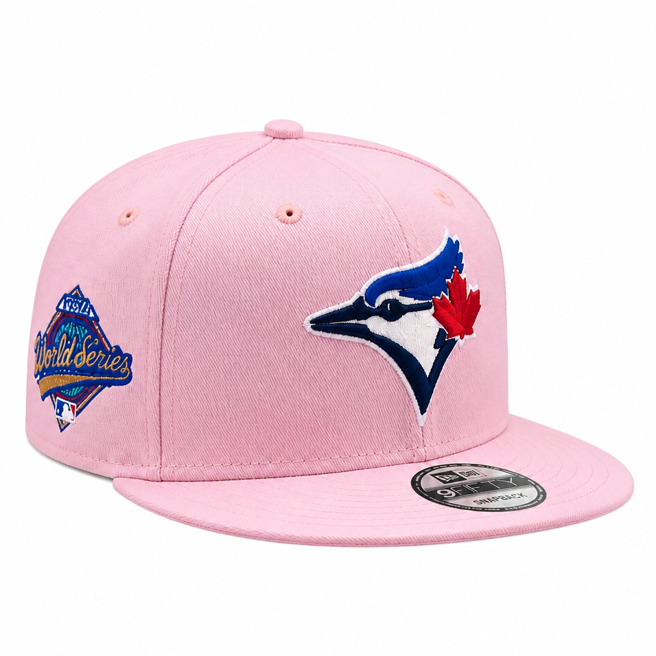 NEW ERA 9FIFTY TORONTO BLUE JAYS 1993 WORLD SERIES EDITION PINK SNAPBACK HAT