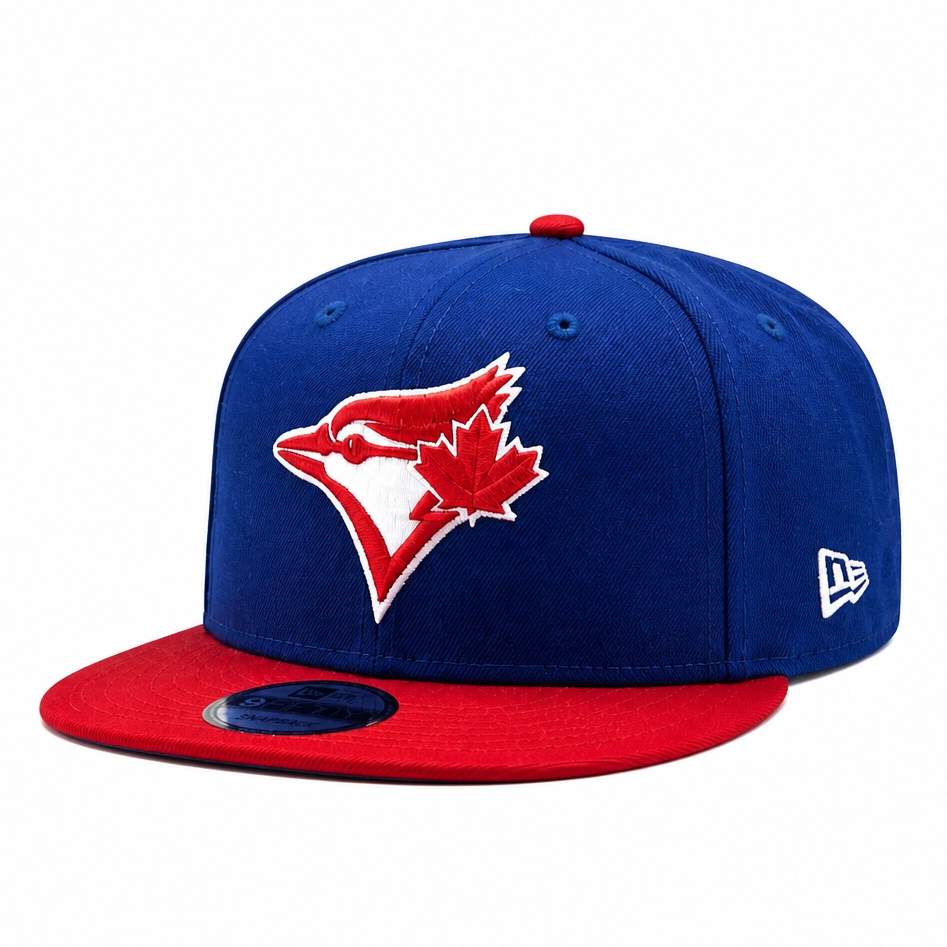 NEW ERA 9FIFTY TORONTO BLUE JAYS DARK ROYAL/SCARLET RED SNAPBACK HAT