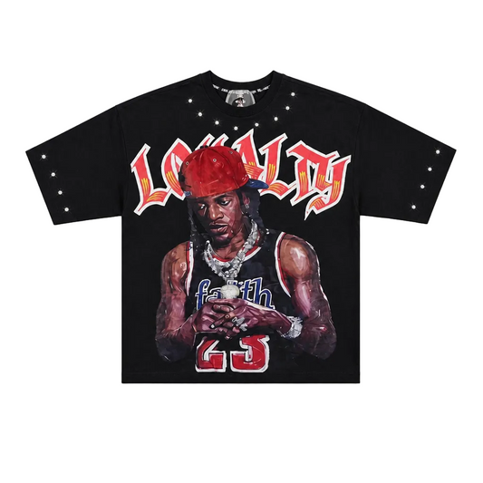 A black short-sleeve graphic t-shirt featuring a painted portrait of basketball player Wilt Chamberlain with the word 'LOYALTY' in red and white stylized lettering across the chest.