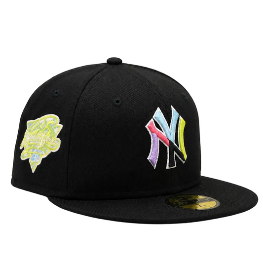 A black New York Yankees fitted cap featuring a multicolor embroidered 'NY' logo on the front and a holographic patch on the side, set against a plain white background.