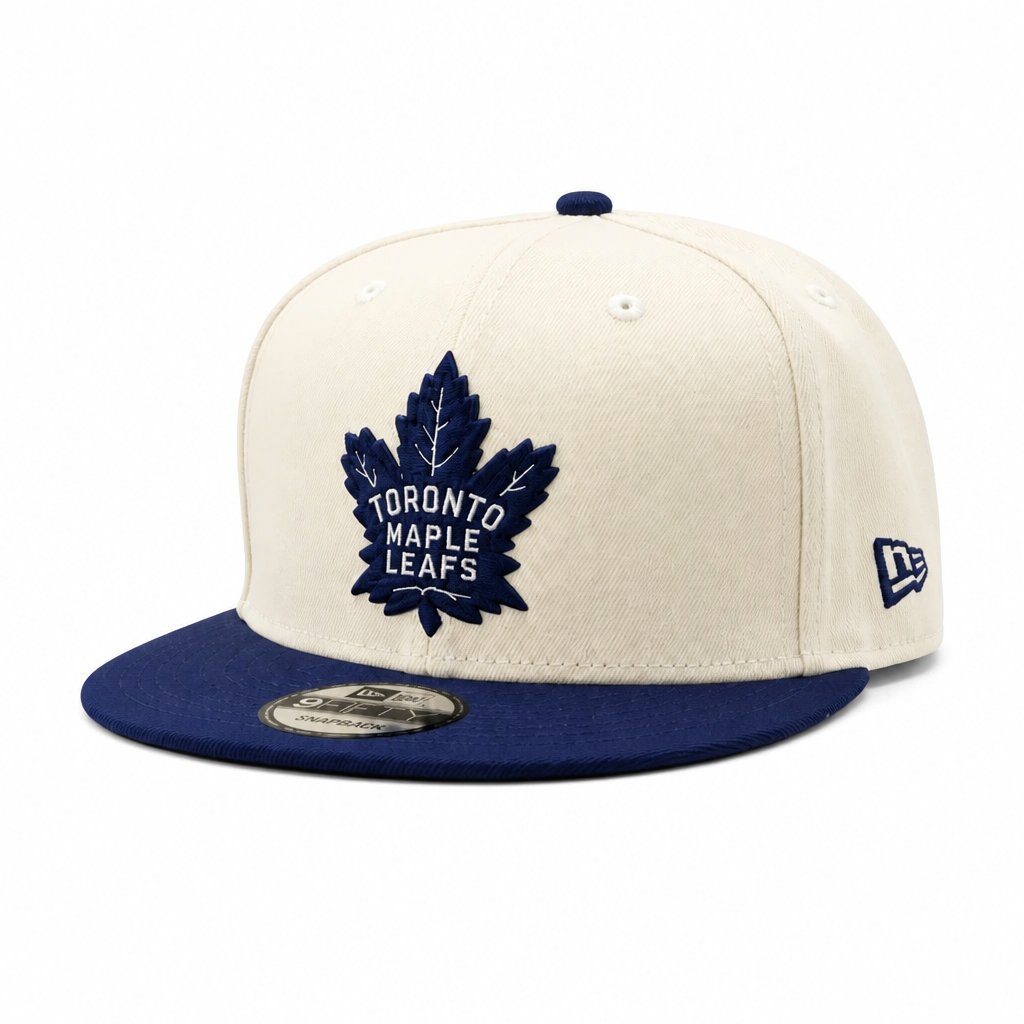 NEW ERA 9FIFTY NHL 75 FOREVER TORONTO MAPLE LEAFS CREAM/NAVY SNAPBACK HAT