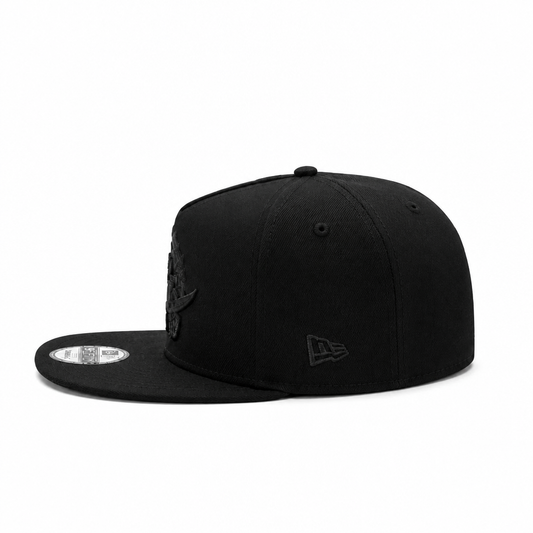 MEN'S NEW ERA NBA 9FIFTY A-FRAME TORONTO RAPTORS DINO LOGO ALL BLACK SNAPBACK HAT