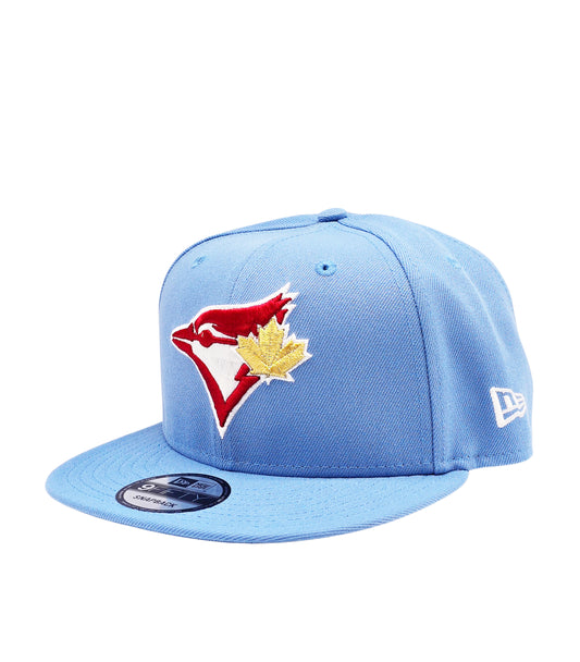 NEW ERA 9FIFTY TORONTO BLUE JAYS 20TH ANNIVERSARY SKY BLUE/RED SNAPBACK HAT
