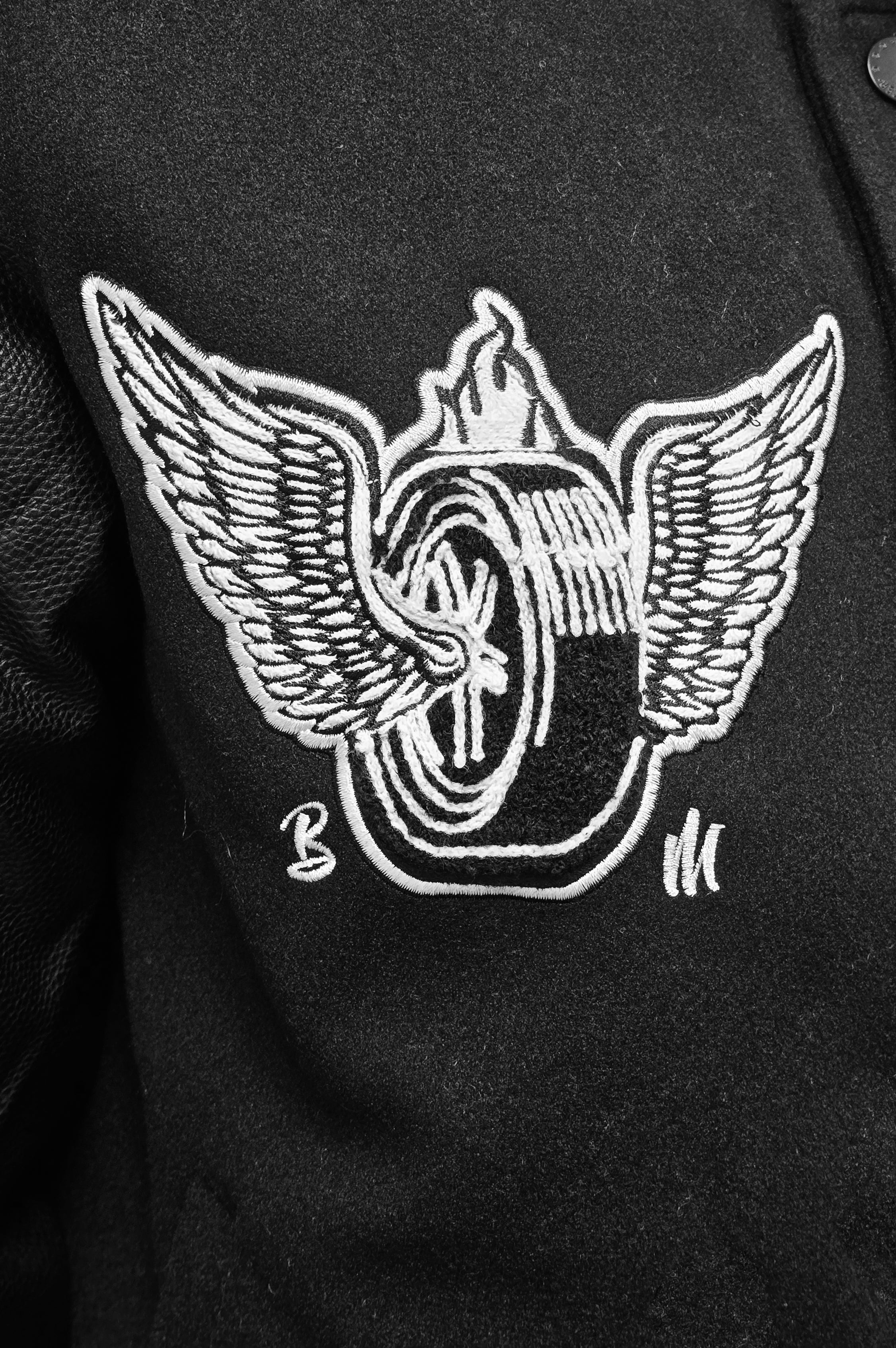 BLEECKER & MERCER MEN'S MIXED FABRIC EMBROIDERED VARSITY JACKET W/ PATCHES (BLACK)