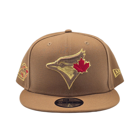 NEW ERA 9FIFTY MLB TORONTO BLUE JAYS 20TH ANNIVERSARY LIGHT BRONZE GOLD SNAPBACK HAT