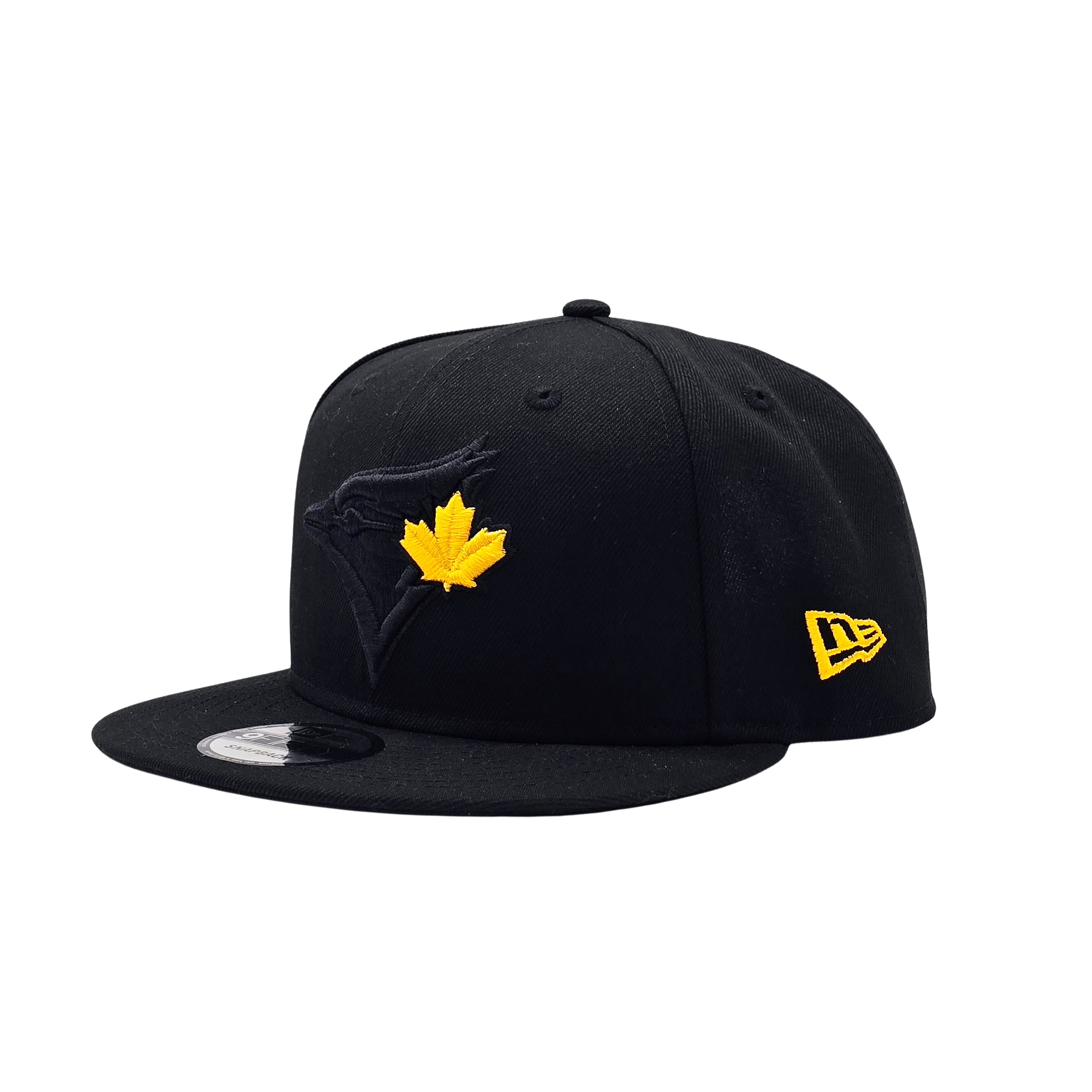NEW ERA 9FIFTY MLB TORONTO BLUE JAYS 20TH ANNIVERSARY ALL BLACK & GOLD LEAF SNAPBACK HAT