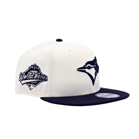 NEW ERA 9FIFTY MLB 1993 WORLD SERIES TORONTO BLUE JAYS OFF WHITE & CHROME NAVY SNAPBACK HAT