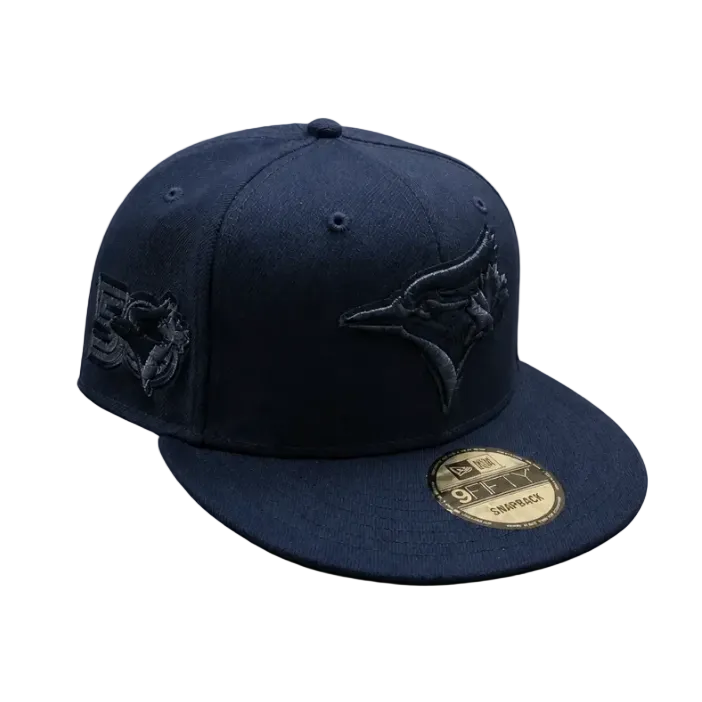 Navy blue cap with embroidered logo on a white background