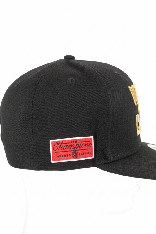 MEN'S 950 NEW ERA TORONTO RAPTORS CHAMPIONS BLACK SNAPBACK HAT