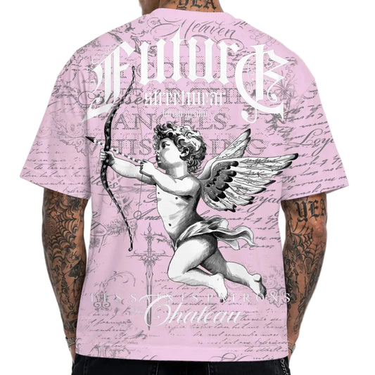 A man viewed from behind wearing a light pink graphic t-shirt with a detailed illustration of a winged cupid holding a bow, gothic-style lettering, and script patterns. He is also wearing black jeans against a plain white background.